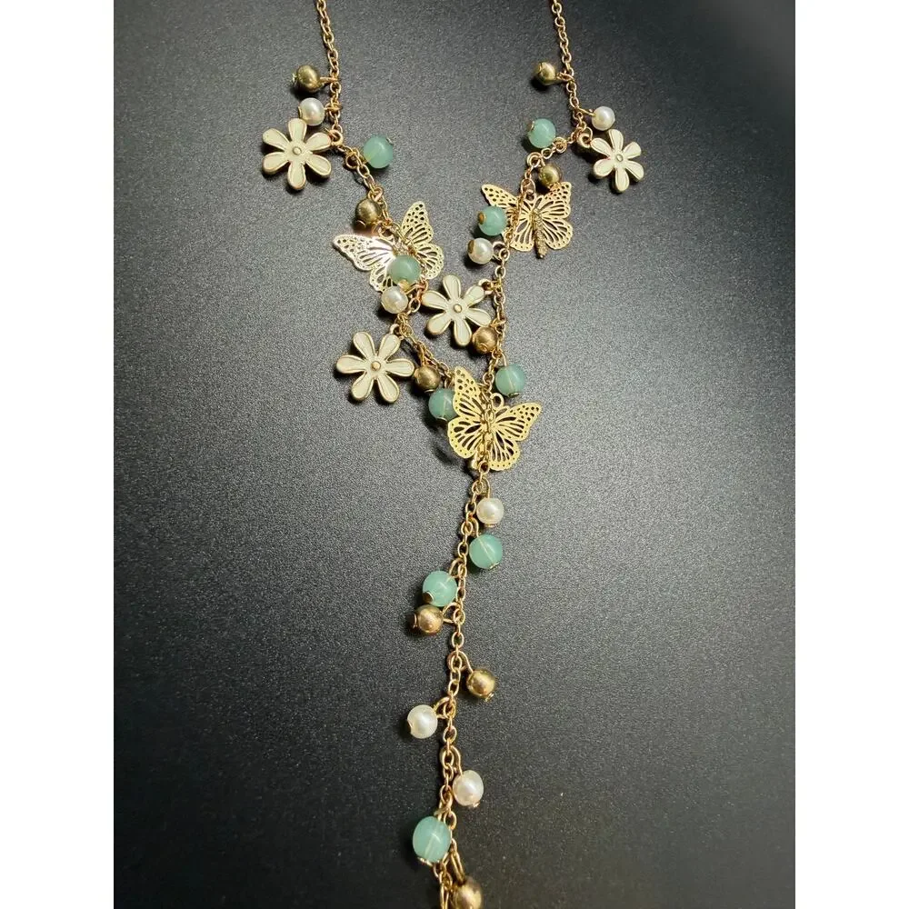 Gold Tone Floral Y-drop necklace delicate white flowers and butterfly charms